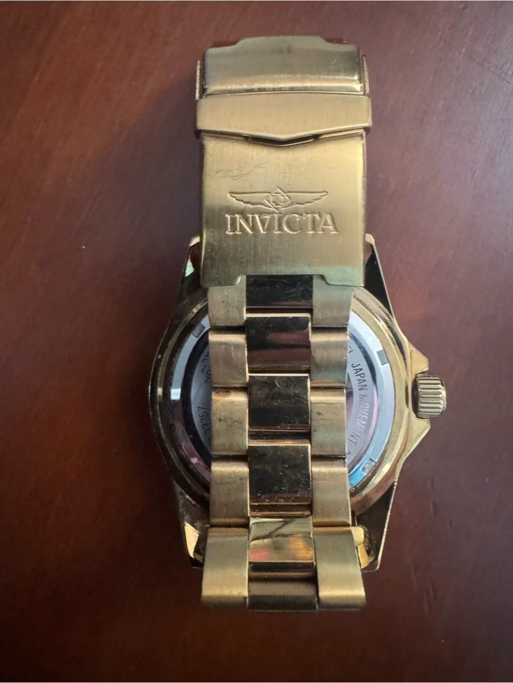 Invicta Gold Tone Men's Watch with Black Dial and Bezel